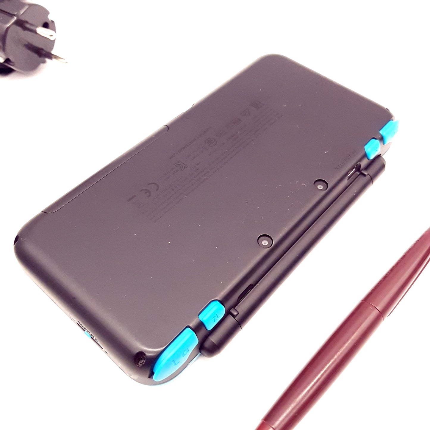 New Nintendo 2DS XL Konsole schwarz türkis - gebraucht - gut bis sehr gut + 5 Spiele