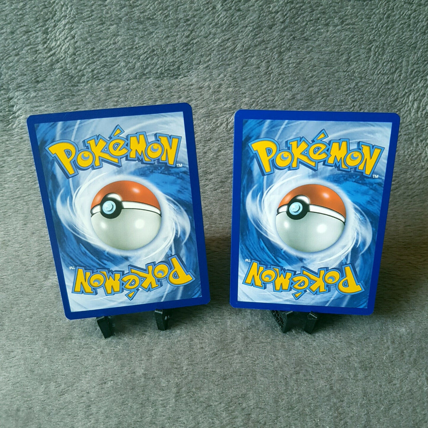 Pokemon - Laukaps 12/236 & Cavalanzas 142/236 - S & M - Welten im Wandel 2019