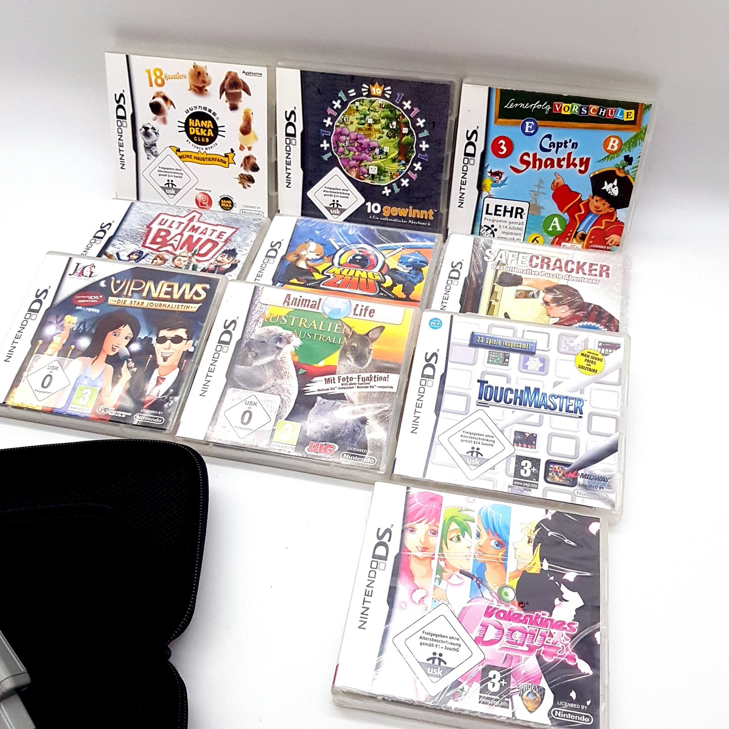 Nintendo DSi XL Konsole bordeauxrot + 10 Spiele - gebraucht - guter Zustand