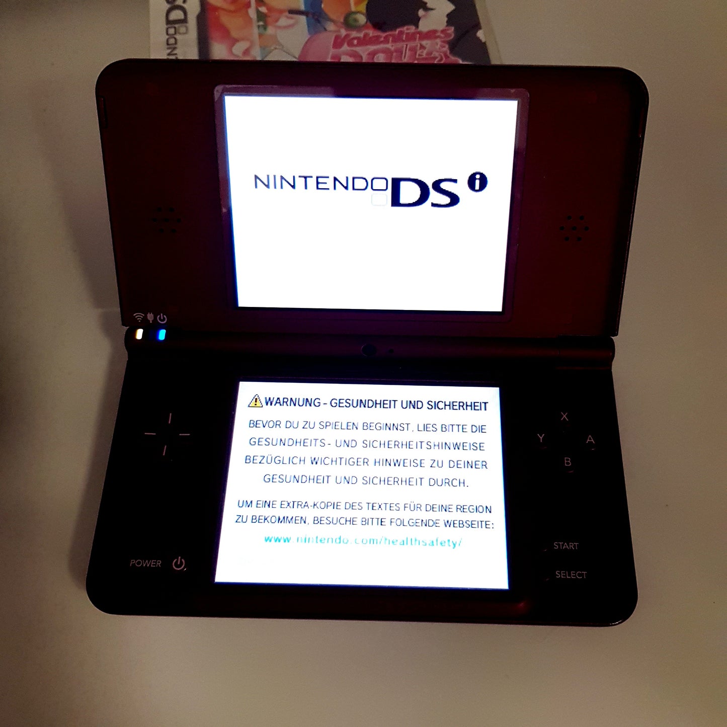 Nintendo DSi XL Konsole bordeauxrot + 10 Spiele - gebraucht - guter Zustand