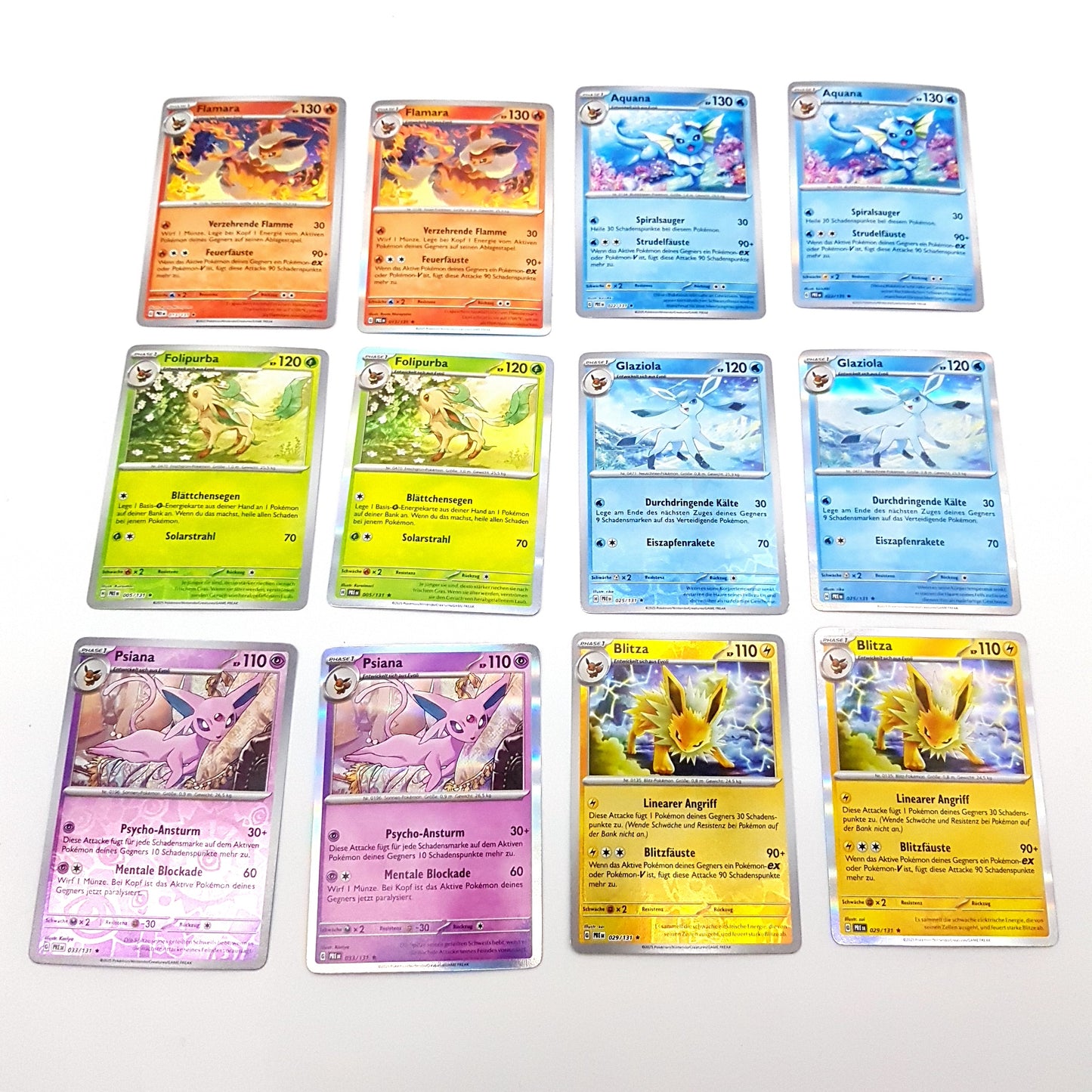 Pokemon - prismatische Entwicklungen - 12 Eeveelutions - reverse & holo - deutsch - near mint