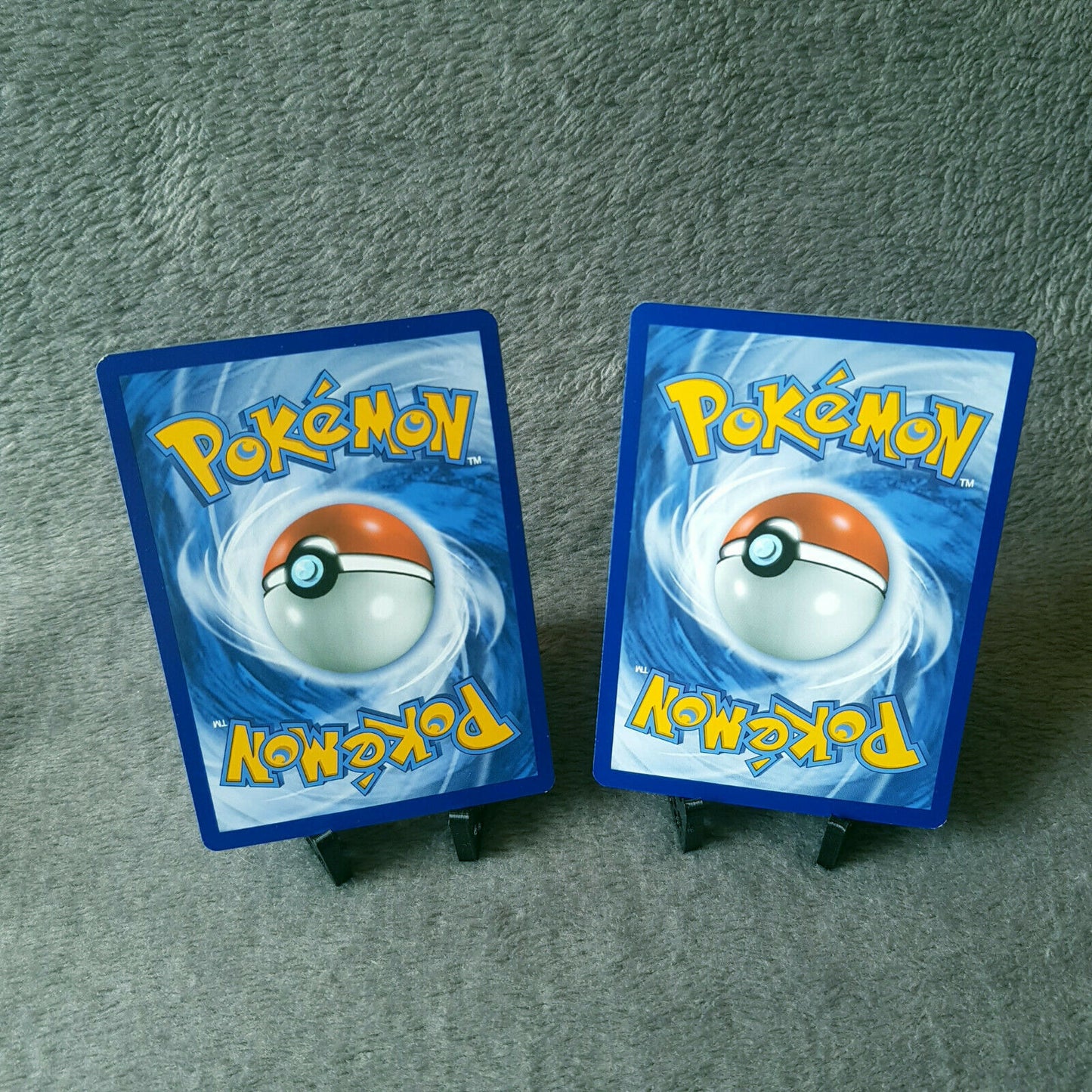 Pokemon - Stollunior 123/214 & Stolloss 125/214 - S&M - Kräfte im Einklang 2019